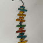 A colorful Little Wood Stacks (Colored) toy hanging from a chain.